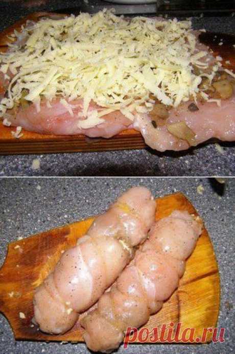 Куриные рулетики с грибами и сыром в сметанном соусе.