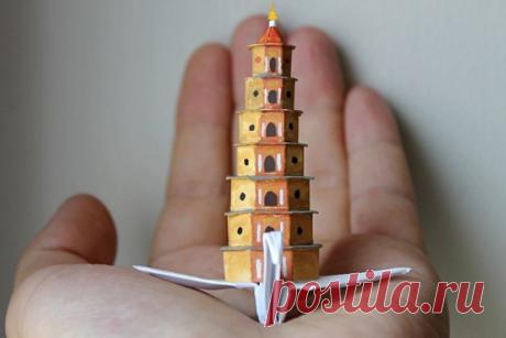 Оригами с мировыми достопримечательностями на крыльях белых журавлей