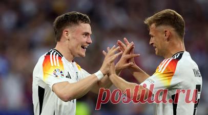 Мастер-класс от хозяев: Германия разгромила Шотландию в матче открытия чемпионата Европы по футболу. Сборная Германии добилась уверенной победы над национальной командой Шотландии в стартовом матче чемпионата Европы по футболу на «Альянц Арене» в Мюнхене. Ещё в первом тайме Флориан Вирц, Джамал Мусиала и Кай Хаверц забили три безответных мяча. Вдобавок ко всему перед перерывом шотландцы остались в меньшинстве после удаления Райана Портеуса за грубый фол на Илкае Гюндогане. А во второй половине…