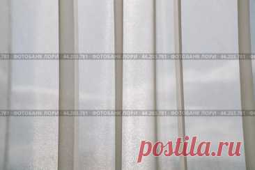 Window with light tulle curtains, sky clouds background Стоковое фото, фотограф Ilaronsia / Фотобанк Лори