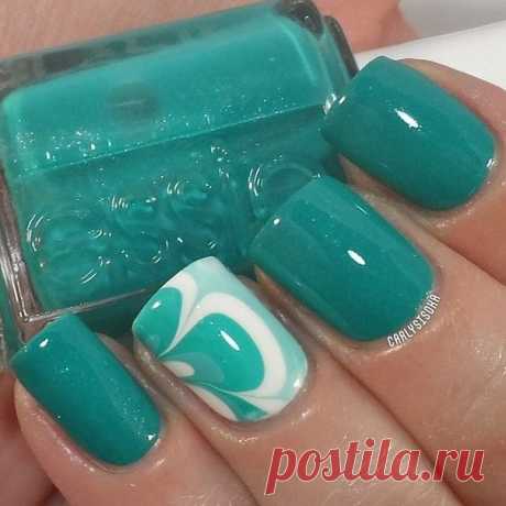 Nail Art #130 If you use the terminology of the fashion industry, turquoise became &qout;the new black&qout; in the nail-art of the year 2015. Almost all the leading manufacturers of paints included collection of variations on turquoise: bright, pastel, matt, glossy, with a holographic effect. Marble nails on one or more f…