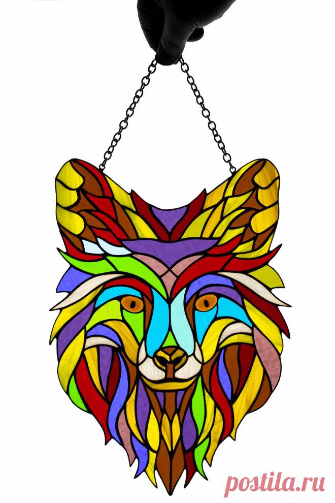 Suncatcher Stained glass window hanging Wolf glass Pop art Stained gla Wolf window hanging suncatcher made of stained glass pieces by my own disign.Handmade using Tiffany copper foil technique.Looks amazing in the lights of a sun.You will get it completely ready for installation. It comes with a self adhesive hook and copper chain.It will be a great gift for friends or relatives. Width: 9