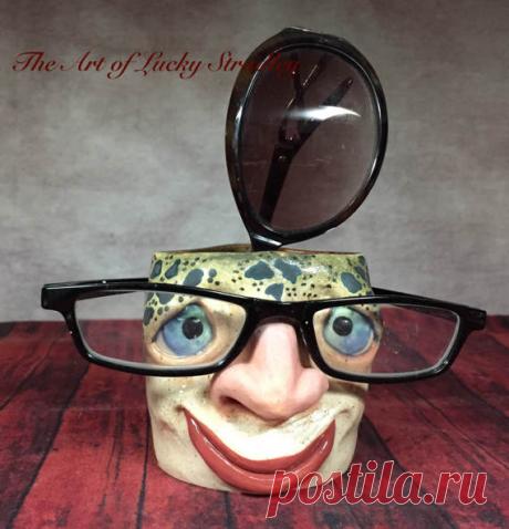 EYEGLASS CADDY - to hold your pens, spare change, rings and things for you. Keep in the bathroom and he can hold your toothbrush. EC22 This is Caicey. He was born February 23, 2017. A lovely home decor accent piece that is just the right size to sit on your shelf, counter top, mantle, bedside table or bathroom vanity. This cute little eyeglass caddy can hold your tooth brush or just empty your pockets of your spare change into the vessel interior. The hook on the back is a...