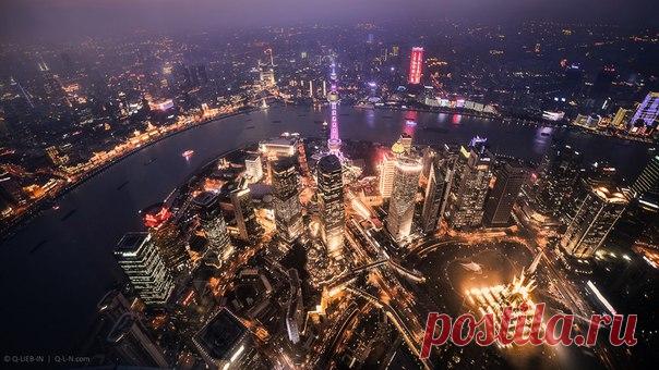 «Пролетая над Шанхаем». Автор фото – Евгений Самученко: nat-geo.ru/photo/user/52530/