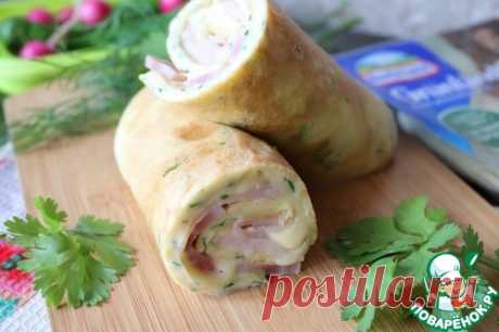 Нежный яичный рулет с сыром и ветчиной – кулинарный рецепт
