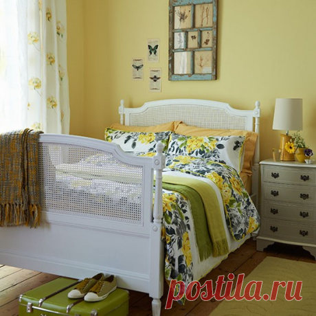 Yellow bedroom with white cane bed and florals | Bedroom decorating | housetohome.co.uk