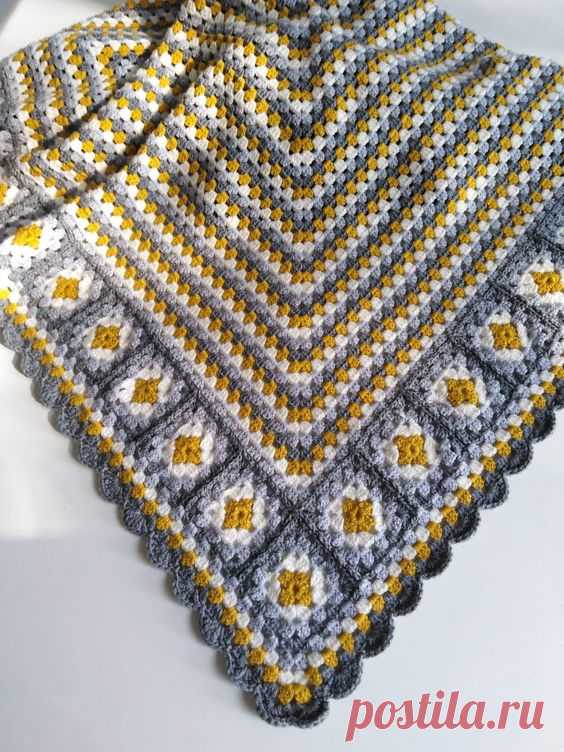 Crcohet Granny square blanket with Granny Square border.