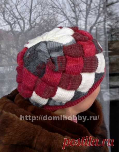 Зимняя шапка спицами узором энтерлак
