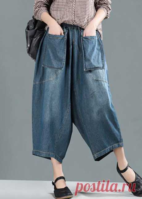 Women Spring Casual Big Pockets Solid Loose Jeans Women Spring Casual Big Pockets Solid Loose JeansThis dress is made of cotton or linen fabric, soft and breathy. Flattering cut. Makes you look slimmer and matches easlily. Materials used: CottonMeasurement:Size L/BUST-118cm      Waist elastic from 66cm / 25.74