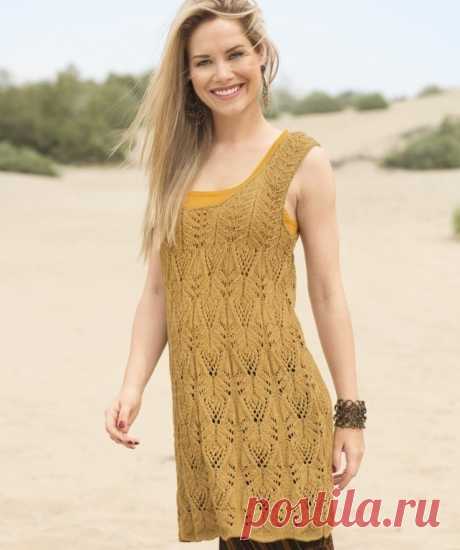 ТУНИКА С АЖУРНЫМИ ПОЛОСАМИ СПИЦАМИ
РАЗМЕР

38/40 (46/48)
ВАМ ПОТРЕБУЕТСЯ
Пряжа (40% мериносовой шерсти, 30% органического хлопка, 30% шерсти опоссума; 124 м/40 г) — 320 (360) г цв. латуни; спицы №4; круговые спицы №4.
УЗОРЫ И СХЕМЫ
АЖУРНЫЙ УЗОР А
Число петель кратно 23 + 2 кромочные = вязать согл. схеме. На ней даны лицевые и частично изнаночные ряды. В неприведенных изнаночных рядах петли провязывать по рисунку, накиды провязывать изнаночными. 

Начать с 1 кромочной, рапп...