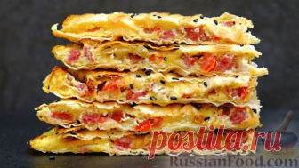 Лаваш с сыром, колбасой, помидорами и яйцами Ингредиенты:Лаваш – 1 шт. Яйцо – 2 шт. Сыр – 100 гр. Колбаса – 100 гр. Помидор (или соленый огурец) – около 60 гр. Соль, черный перец – по вкусу Кунжут – по желаниюВидео рецепт: Пошаговый фото рецепт: Лаваш с сыром, колбасой, помидорами и...
