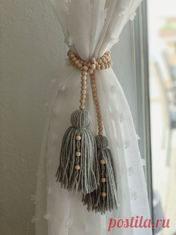 This wood bead garland has two tassels on each end. You can wrap around the garland to your area of choice! I love how unique this is and how simple it is to accent your draping and curtains as we did…