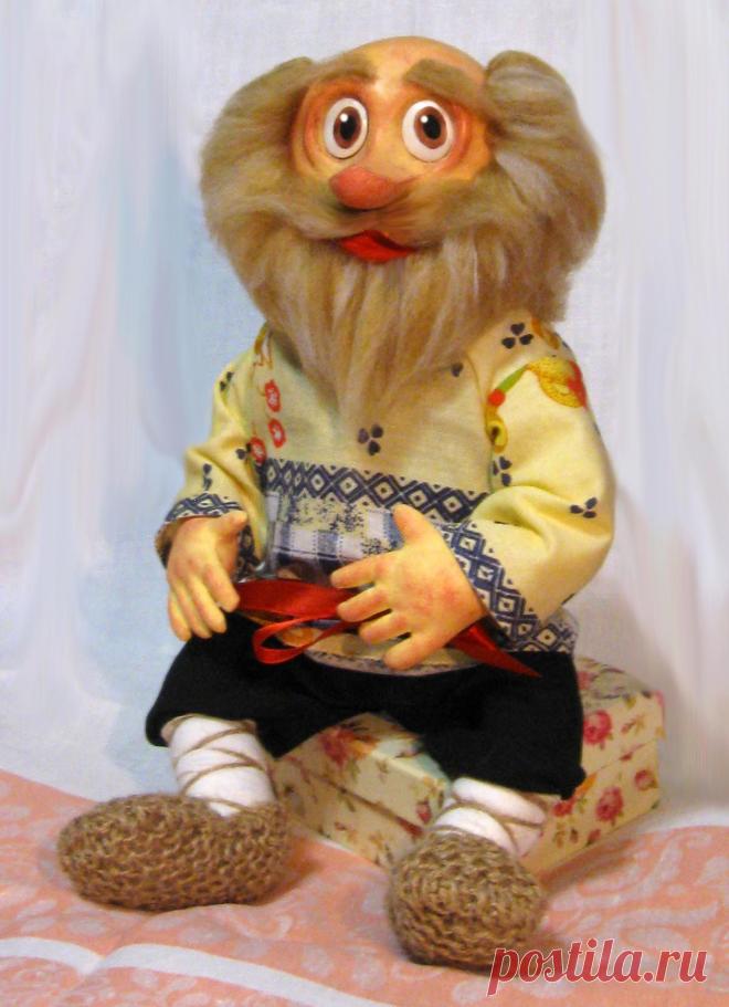 А этого дедушку домового зовут Евдоким.