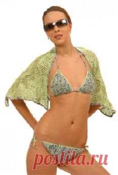 Зеленый купальник.