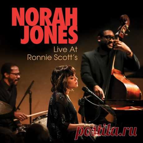 Norah Jones - Live At Ronnie Scott's (FLAC/Mp3) "Live At Ronnie Scott's" — запись выступления Норы Джонс во всемирно известном джаз-клубе Ронни Скотта в Лондоне, в сопровождении барабанщика Брайана Блейда и басиста Кристофера Томаса, благодаря которым на сцене сформировалось классическое джазовое трио. Группа играет треки с шестого