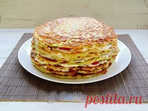 Кабачковый торт: просто вкуснятина!

на 100грамм - 85.29 ккал  Б/Ж/У - 5.44/3.07/8.59 

Ингредиенты: 

Кабачки – 1 кг 
Яйца – 5 шт 
Помидоры – 300 г 
Мука цельнозерновая - 1 ст 
Йогурт натуральный – 350 г 
Чеснок – 10 г 
Сыр – 150 г 
Зеленый лук – 10 г 
Соль, перец – по вкусу 

Приготовление: 
Кабачки натрите на тёрке и отожмите лишний сок. Добавьте 5 яиц, немного соли, молотого чёрного перца и хорошо перемешайте. Добавьте муку. Тщательно смешайте компоненты теста. Тесто д...