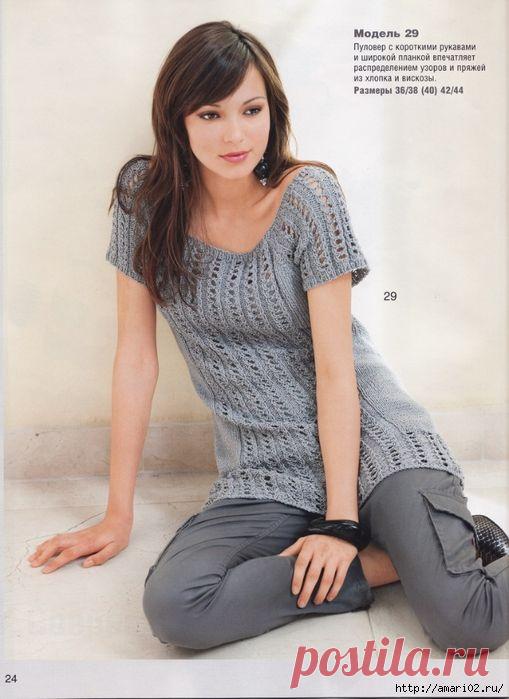 Длинный пуловер с ажурными полосами.