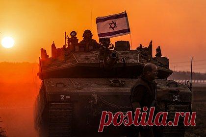 ЦАХАЛ показал работу танков и войск в секторе Газа. Армия обороны Израиля опубликовала кадры работы сухопутных войск ЦАХАЛ, действующих в секторе Газа. В частности, показана работа пехоты, инженерных войск и танков, которые действовали сегодня ночью и днем в секторе Газа. Ранее Израиль заявил о расширении наземной операции.