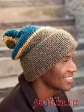 Веселая цветная шапка Теплая шапка для мужчин, связанная на спицах из шерстяной пряжи. Для вязания используется пряжа трех цветов. ...