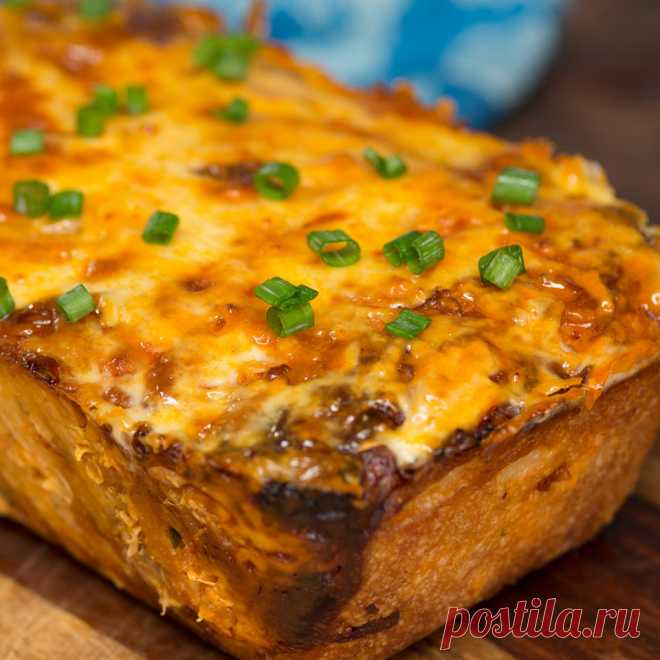 Buffalo Chicken Pull-Apart Bread ~ Recipe Recipe with video instructions: The only way to improve shareable bread is with Buffalo chicken and lots of cheese. Ingredients: 2 packages Pillsbury pizza dough, 2 cups chicken, cooked and shredded or diced, 1 cup Buffalo sauce, ¼ cup scallions, chopped, 2 ½ cups shredded pepper jack cheese, ½ cup unsalted butter, melted, 1 jalapeño, sliced (optional), Ranch dressing for dipping (optional)