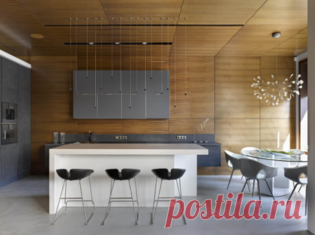 Главные материалы первого этажа - орех и серый камень, дающие глазам отдохнуть от городской пестроты. Второй этаж загородного дома с тремя спальнями смотрите по ссылке >>