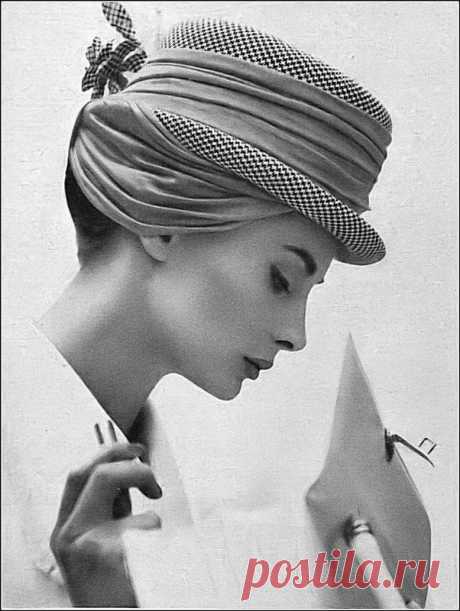 Nancy Egerton is wearing a brief bowler swathed round a sh… | Flickr
