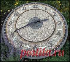 Cobble Clock, by Maggy Howarth at Lowther Gardens, Lytham, Lancashire, UK. www.maggyhowarth.co.uk