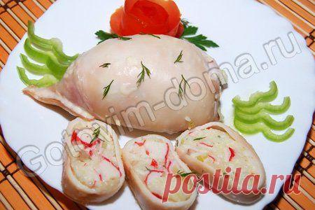 Кальмары, фаршированные рисом и крабовыми палочками