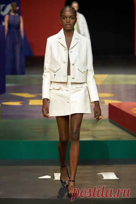 Image may contain Clothing Apparel Coat Human Person Runway and Fashion