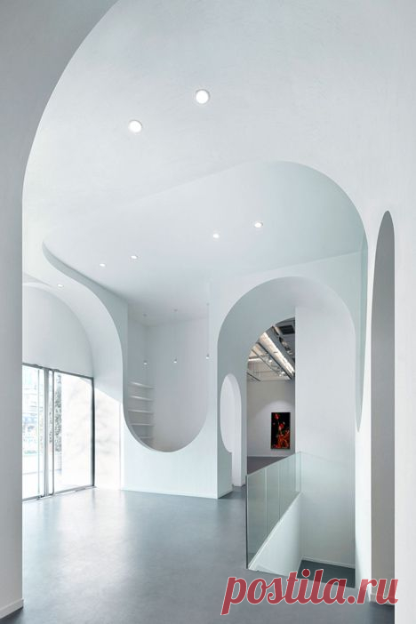 Beijing art gallery by Penda featuring topsy-turvy archways
