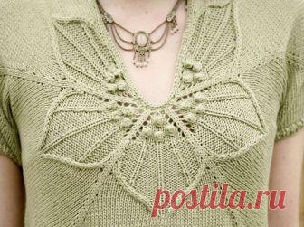 Джемпер с горловиной-цветком. Спицы Вязаный спицами джемпер с красиво оформленной горловиной в виде цветка. Описание и схемы