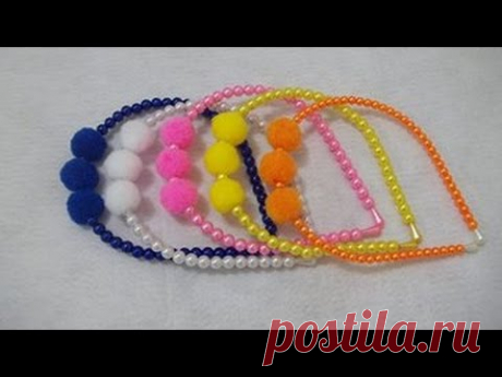 Arco de perolas com pompons