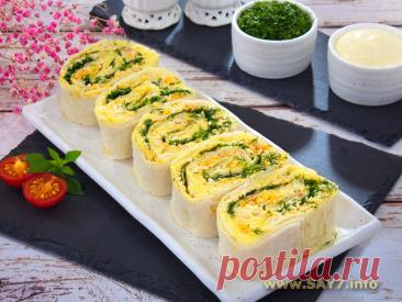 Рулет из лаваша «Мимоза». Очень вкусные, нежные рулетики. Могут стать украшением праздничного стола. Можно начинку приготовить заранее, а перед подачей быстренько завернуть ее в лаваш. Вместо горбуши можно использовать сайру в собственном соку. Размеры лаваша, который я использовала - 30х45 см.