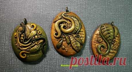 Olive Garden Pendant Trio This is three polymer clay pendants made with green and metallic gold clay. I call it my 'Olive Garden' series. :)