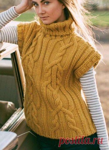 Безрукавка с высоким воротником связана 