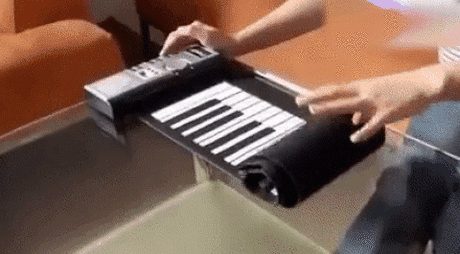 US$ 119.99 - 61 Key Roll-Up Portable Piano Keyboard - www.cccinlife.com