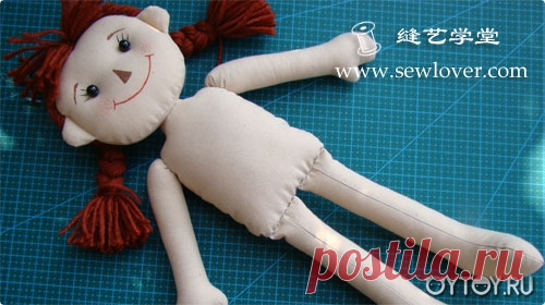 Текстильная кукла Raggedy Ann.