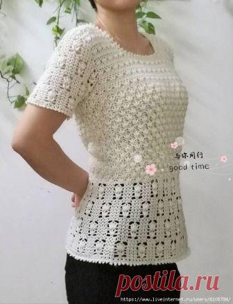 Белая ажурная кофточка, выполненная миксом узоров.