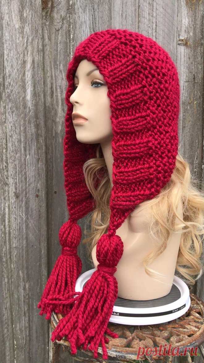 Dec 4, 2020 - Note: This hat has a sparkly metallic thread running throughout the piece, please zoom in on the photos to better to see it. If you would prefer the same hat without the sparkle, please contact me, I would be happy to make one for you.  Style: Chunky bonnet style hat with fluffy tassels in each ear