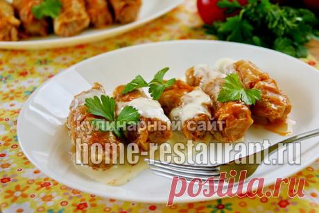 Голубцы в духовке в томатно-сметанном соусе: рецепт с фото