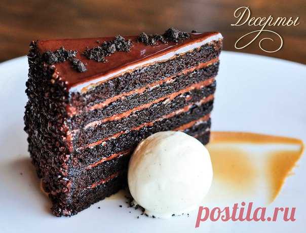 Многослойный шоколадный торт 

Ингредиенты 
Шоколадные бисквиты: 
1,5 ст. муки 
Показать полностью…