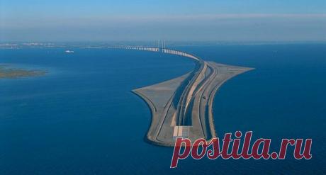 Удивительный мост-тоннель, соединяющий Данию и Швецию Эта уникальная дорога связывает столицу Дании Копенгаген со шведским городом Мальмё. Эресуннский мост, спроектированный датским архитектором Георгом
