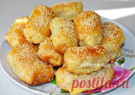 Слоеные трубочки с ветчиной и сыром из готового теста! https://ochenwkusno.ru...