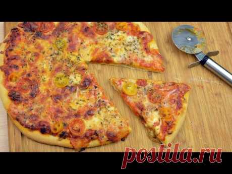 How to Make Margherita Pizza - Easy Homemade Margherita Pizza Recipe Learn how to make a delicious Margherita pizza at home. This homemade pizza recipe is pretty simple to make and tastes fantastic!

► How to Make Basic Pizza Dough
https://www.youtube.com/watch?v=M0BxLpjOSlU

► Italian-Style Tomato Sauce
https://www.youtub