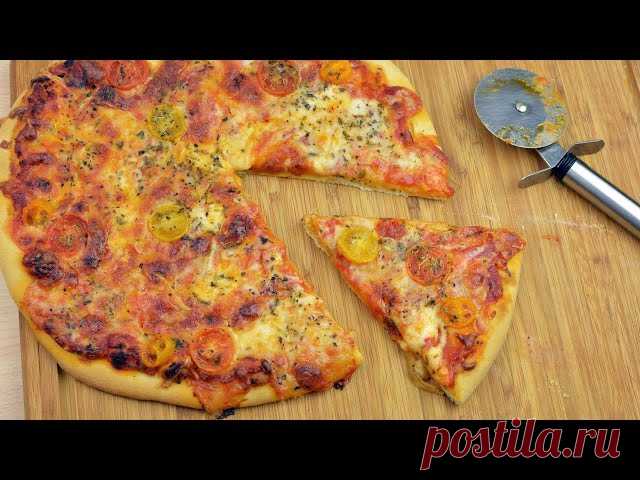How to Make Margherita Pizza - Easy Homemade Margherita Pizza Recipe Learn how to make a delicious Margherita pizza at home. This homemade pizza recipe is pretty simple to make and tastes fantastic!

► How to Make Basic Pizza Dough
https://www.youtube.com/watch?v=M0BxLpjOSlU

► Italian-Style Tomato Sauce
https://www.youtub