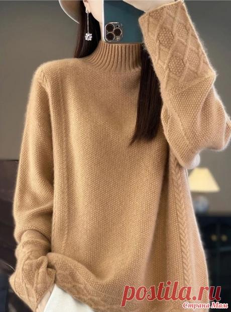 Лаконичная модель Лаконичная, но очень красивая модель. Основная часть связана мелким жемчужным узором. Акцент сделан на нижнюю часть рукавов, они связаны узором из ромбов. Раппорт - 12 петель и 60 рядов.