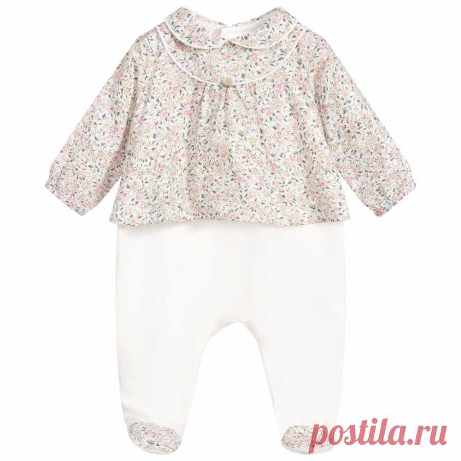 Ivory Cotton Velour Babygrow  Pretty, super soft, ivory cotton velour babygrow for girls by Pureté Du... Bébé. It has a grey and pink floral cotton blouse overlay and feet to match. The brand's mother-of-pearl logo charm is sewn on the front.
