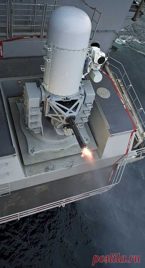 A Phalanx close-in weapons system fires during ... | Weapons & 2nd Am…