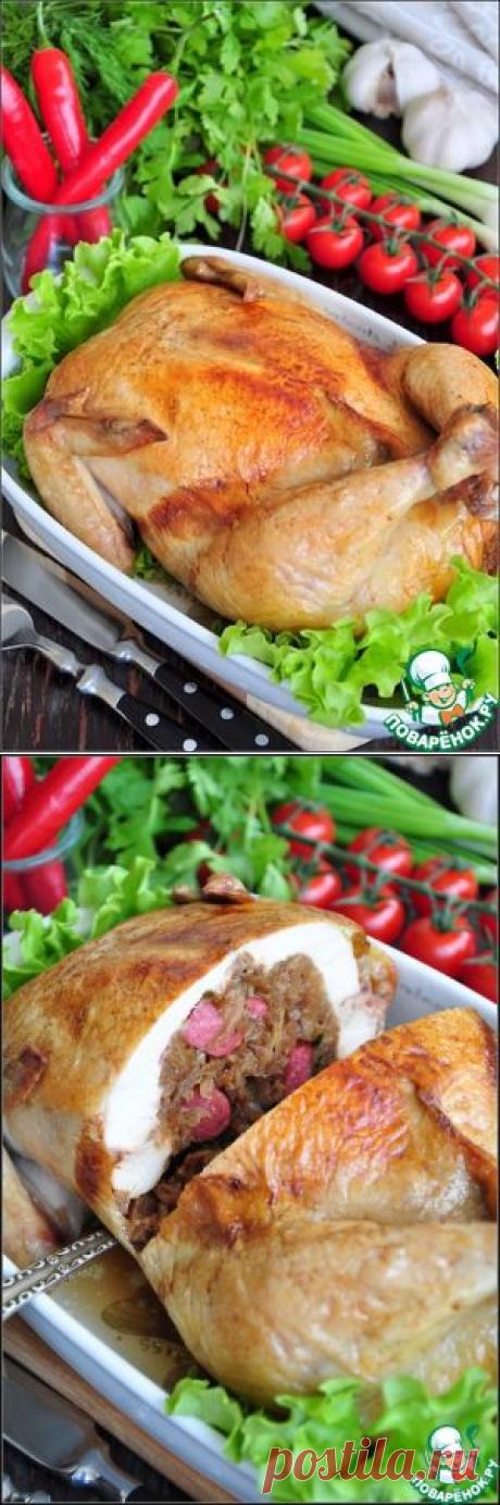 Курица без костей, фаршированная тушеной капустой и охотничьими колбасками
