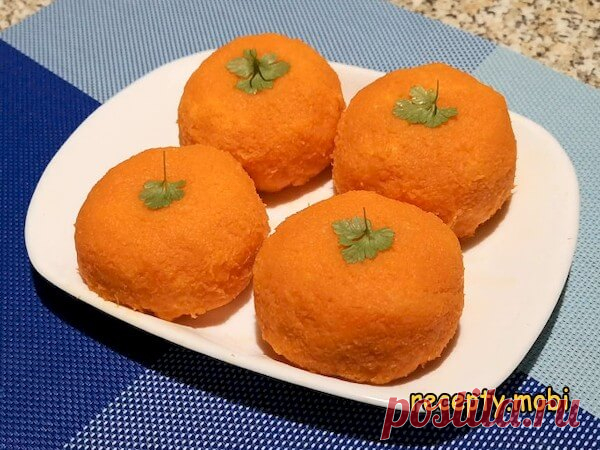 Закуска «Мандаринки»

✅ Ингредиенты
▫ морковь – 5 штук (средних);
▫ отварные куриные яйца – 3 шт;
▫ чеснок – 3 зубчика (крупных);
▫ плавленый сырок – 3 шт;
▫ майонез – 50-100 г.
▫ петрушка для украшения.